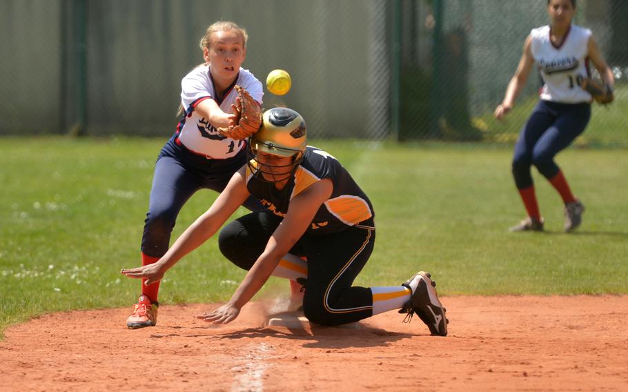 Vicenza's Beatrice Afoa-Galo reaches third base as Lakenheath's Reiley Kenk waits for the throw in a DIVISION I game at the DODEA-Europe softball tournament in Ramstein, Germany, Thursday, May 25, 2017. Lakenheath won 15-5.