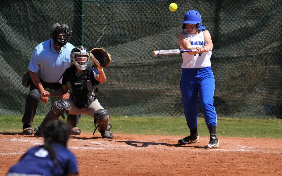Rota's Elizabeth Lamb connects for an RBI hit in a game against Bitburg at the DODEA-Europe softball tournament in Ramstein, Germany, Thursday, May 25, 2017. Rota won 13-9.