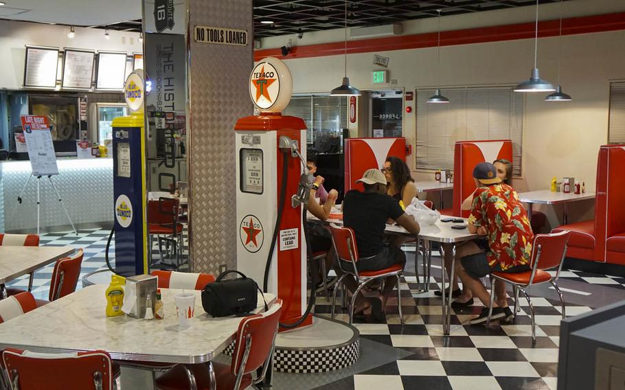 Diners enjoy a meal at Route 16, a 1950s-style diner at Yokota Air Base, Japan, around 3 a.m. on Sunday, July 16, 2017.