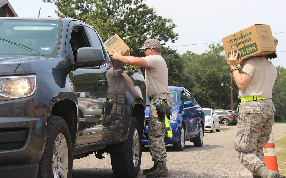 Ken-Yon Hardy/ Stars and Stripes         Members of the 136th Airlift Wing of the Texas National Guard provide Emergency Ration Meals to residents of China, Texas on September 3, 2017.