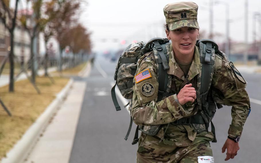 Capt. Lauren Ulmer nears the finish line of an 18.6-mile march at Camp Humphreys, South Korea, Thursday, Nov. 2, 2017.