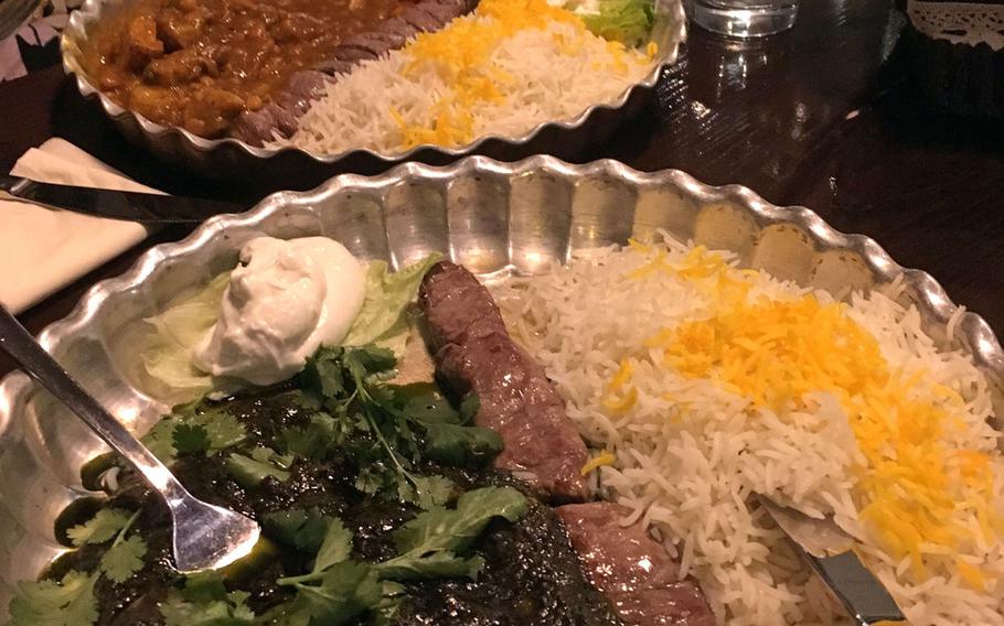 Saffron-flavored rice, lamb and beans served with a sticky sauce is one of the offerings at Safran, a Persian restaurant in Stuttgart, Germany.
