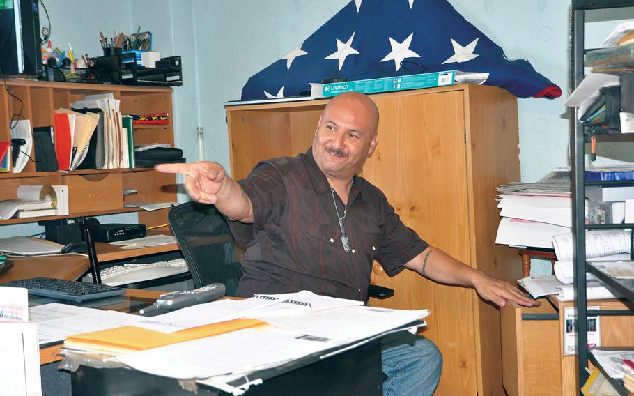 Deported veteran Hector Barajas, is busy at his desk at the shelter he founded in Tijuana, Mexico on June 1, 2016. Barajas is being considered for naturalization after seven years of deportation.