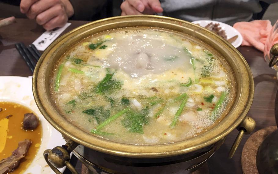 The lamb-bone soup from Tohoku Jinka in Yokohama, Japan, is a good dish for those who appreciate spicy food.