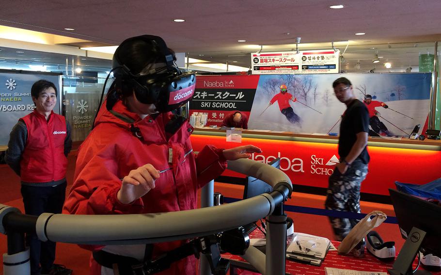 Visitors to the Naeba Prince Hotel in Niigata Prefecture, Japan, try out virtual-reality skiing.
