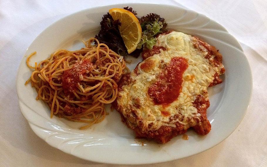 Pork scaloppine with a side of Bolognese as served at Rossini in Kaiserslautern, Germany. 