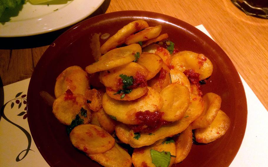 Coriander and lemon roasted potatoes at Saytoune restuarant in Wiesbaden, Germany. Open since 2007, the restaurant serves a wide variety of Mediterranean favorites including couscous, lamb and saffron rice.