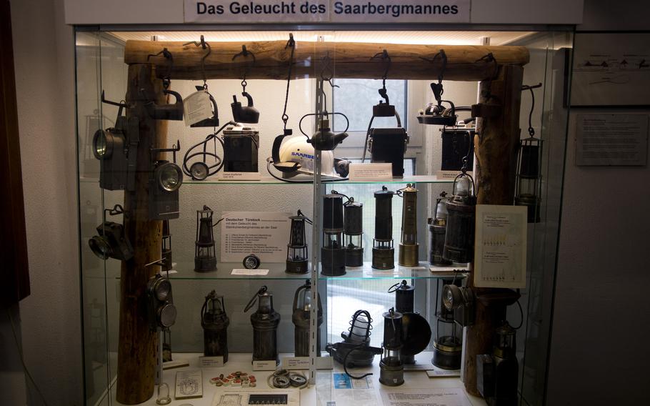 A mining museum's collection wouldn't be complete without a display case of lighting equipment.