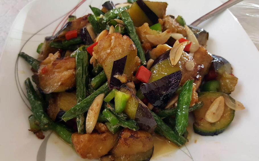 The green string beans with eggplant from Hunan Cuisine in Honolulu is as colorful as it is delicious.