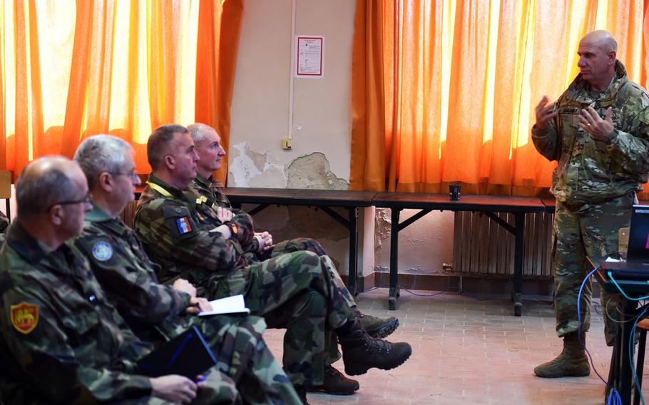 Brig. Gen. Mark Malanka, commander of the 40th Infantry Division, goes over his strategy with NATO commanders during Exercise Citadel Guibert, Wednesday, March 21, 2018.