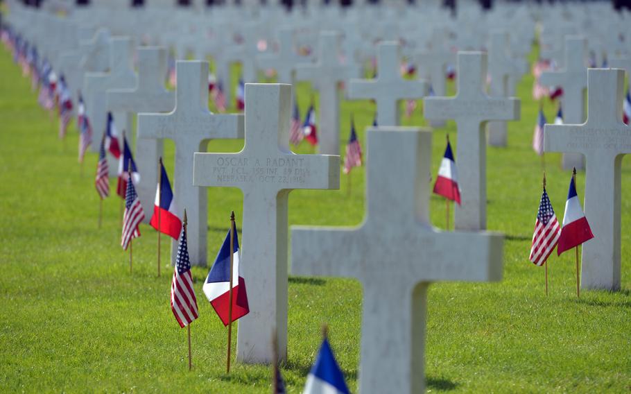 Graves at Meuse-Argonne American Cemetery, decorated with American and French flags for Memorial Day. The cemetery is the largest administrated by the American Battle Monuments Commission in Europe.