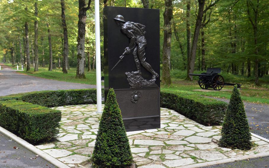 The Marine Monument at Belleau Wood is a life-size bronze bas-relief that depicts a U.S. Marine attacking with a rifle and bayonet. It was created by sculptor Felix de Weldon. It stands, surrounded by artillery on the World War I Belleau Wood battlefield, near Aisne-Marne American Cemetery.