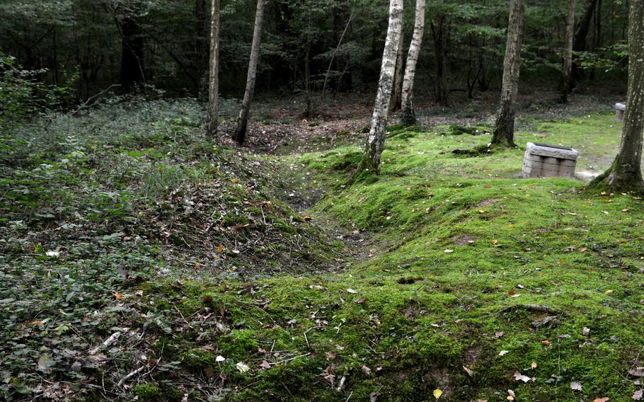 One hundred years later, vestiges of shell holes, trenches and weapons can be seen on the Belleau Wood battlefield near the Marine Monument.