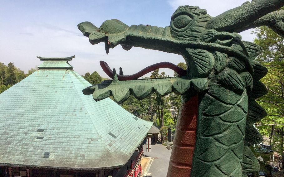 Carved dragons, which become giant thanks to forced perspective, accessorize staircases at the Yamaguchi Kannon temple in Kamiyamaguchi.