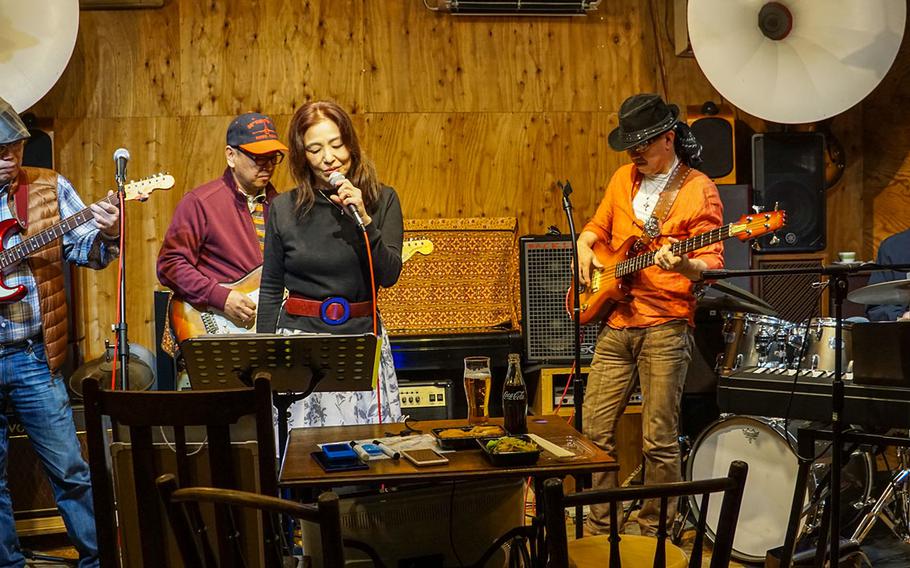 A band plays at the Cafe de Noel, a live music venue near Yokota Air Base, Japan, March 23, 2018.