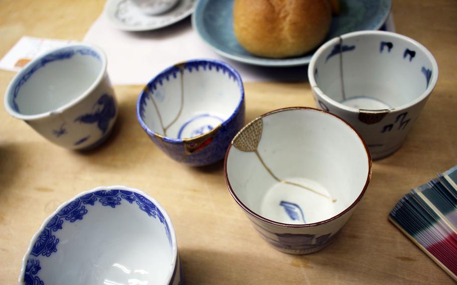  In the Japanese art of kintsugi, chipped ceramics are repaired with epoxy and clay and painted with gold dust.