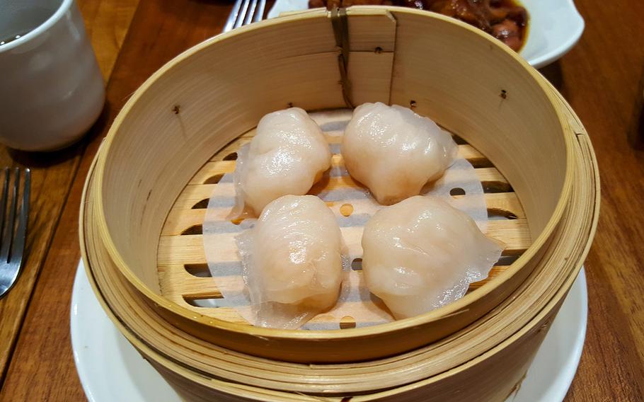 The delectable steamed shrimp dumplings, or har gow, at Tim Ho Wan are fresh and delicate. Each dumpling contains a complete, immaculately fresh shrimp encased in an opaque rice wrapper. 