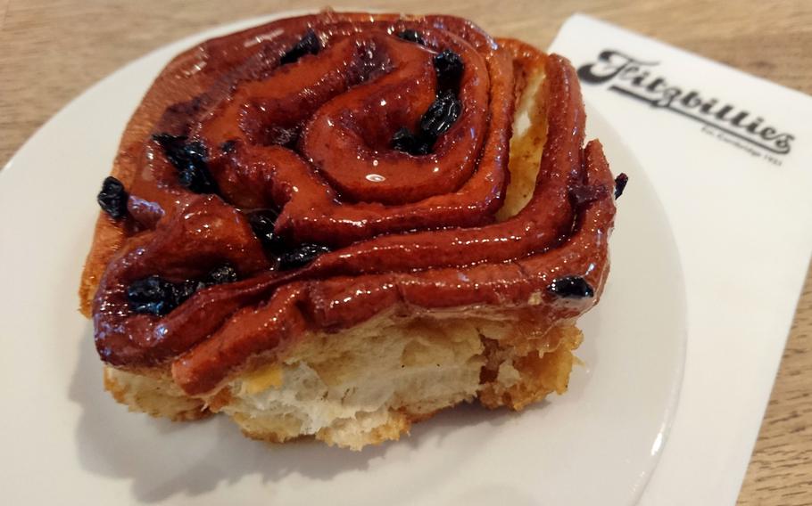 A traditional sticky Chelsea bun served at Fitzbillies in Cambridge, England, Tuesday, June 5, 2018. The buns are made from a rich yeast dough, flavored with lemon peel, cinnamon or mixed spices and then spread with a mixture of currants, brown sugar and butter.