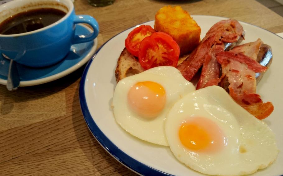 A full English Breakfast with coffee at Fitzbillies in Cambridge, England, Tuesday, June 5, 2018. Breakfast is served from opening to 4 p.m., with prices from 7.50 to 12 pounds ($10.10 to $16.10).