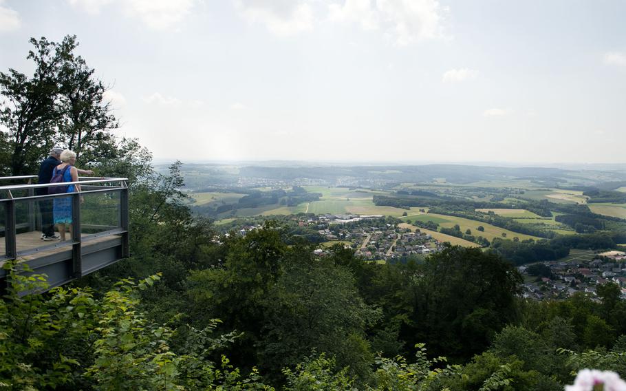 A couple take in the view from the Schaumberg Alm in Tholey, Germany.