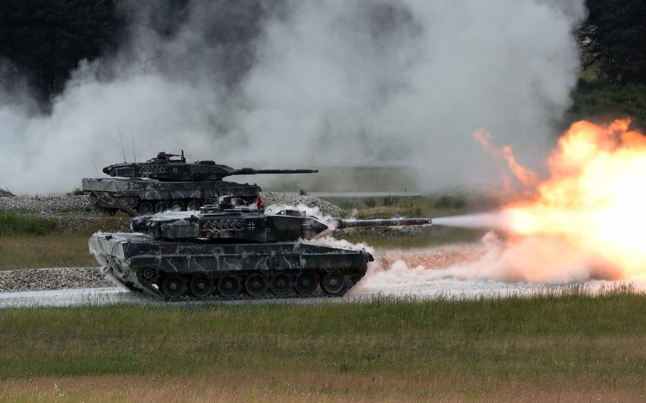 The German tank team fires at targets from its Leopard 2A6 tanks during the Strong Europe Tank Challenge in Grafenwoehr, Germany, Friday, June 8, 2018.
