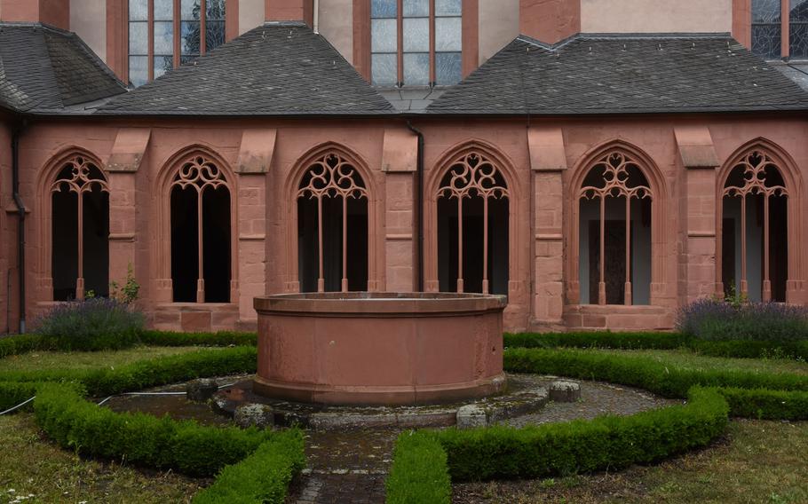 Each portal inside the cloister at St. Stephan's church in Mainz, Germany, has a different lattice-pattern, cut from red sandstone.