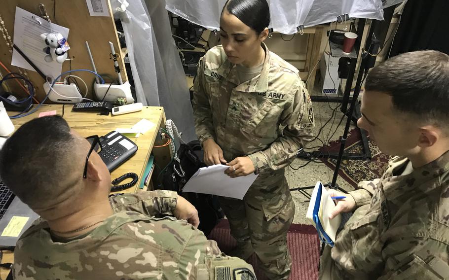 Cpl. Ruby Cruz, 24, center, deployed to Afghanistan shortly after working on Hurricane Maria recovery efforts after the storm devastated her home last fall. Cruz is a member of the Puerto Rico Army National Guard's 191st Regional Support Group Forward in Kabul. 

