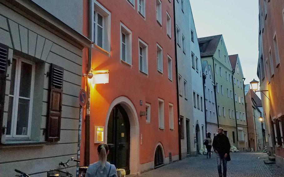 The entrence to Dragonbirds Sushi, down a narrow alley in Regensburg, Germany, Wednesday, May 2, 2018.