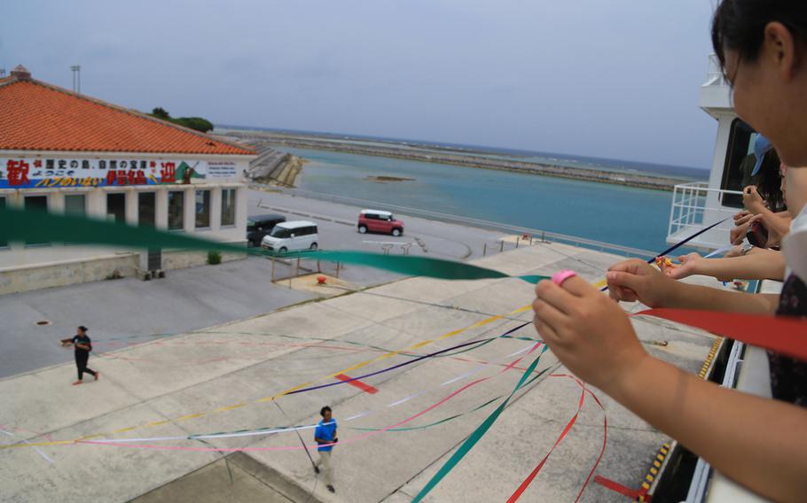 When the ferry departs Izena, the island's residents offer visitors a delightful send-off in the form of colorful paper streamers and cheerful goodbyes.