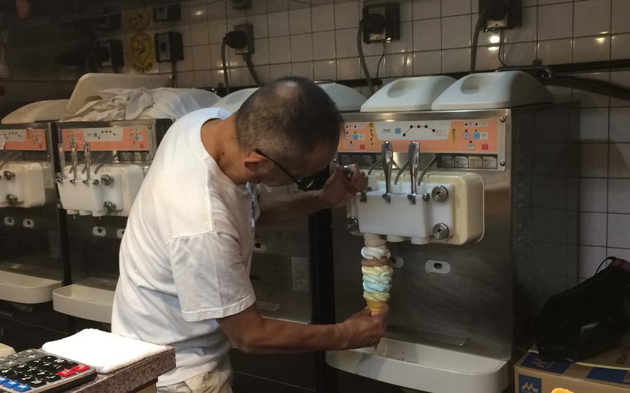 The staff at Daily Chico assemble the large ice cream cones quickly and calmly, all in just under a minute.
