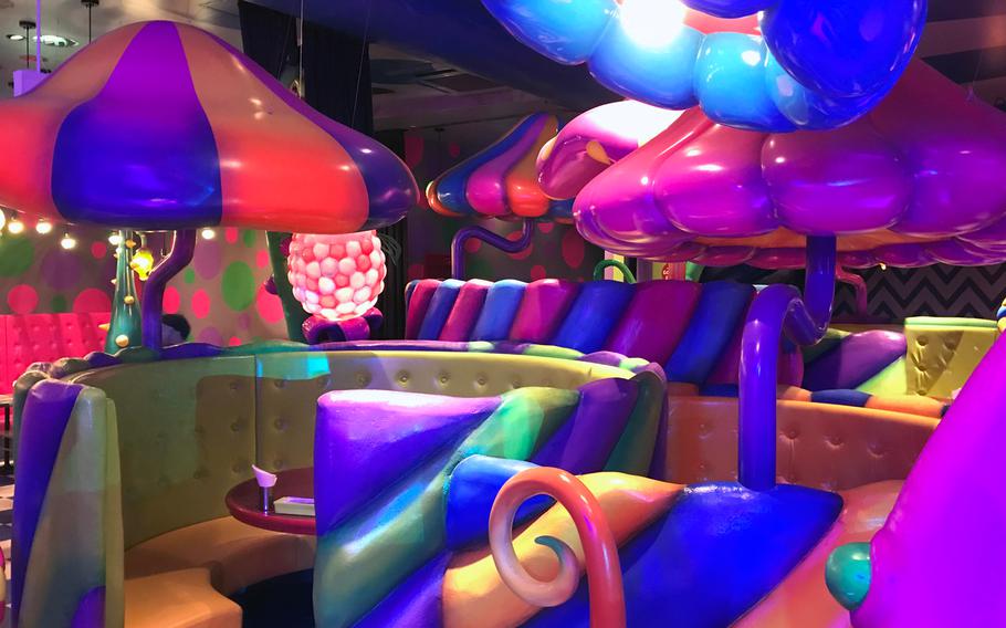Kawaii Monster Cafe's Mushroom Disco section is filled with illuminated fiberglass mushroom pillars and makes customers feel like they're dining in a magical technicolor forest.