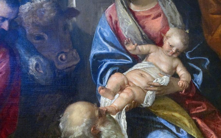 A close-up of the baby Jesus in Veronese's "The Adoration of the Magi" in the Chiesa di Santa Corona in Vicenza, Italy, shows something rarely seen in Renaissance art: a baby Jesus who's none too thrilled that a Magi is kissing his foot.