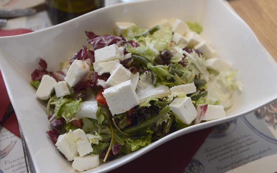 The Greek salad at Oniga, a restaurant in Venice, Italy, comes with green beans and capers.