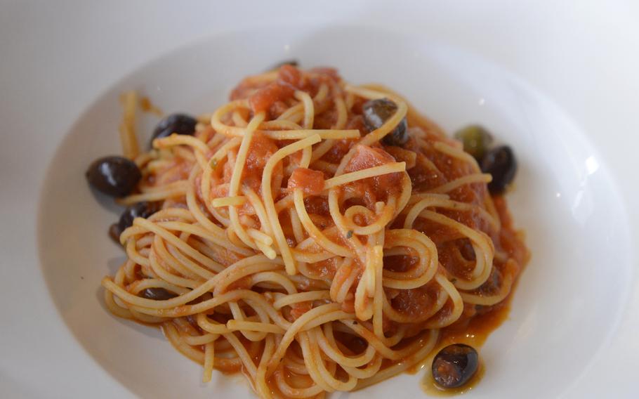 This dish of spaghetti featuring tomato sauce and olives was part of a set menu deal at Oniga, a restaurant in Venice, Italy.