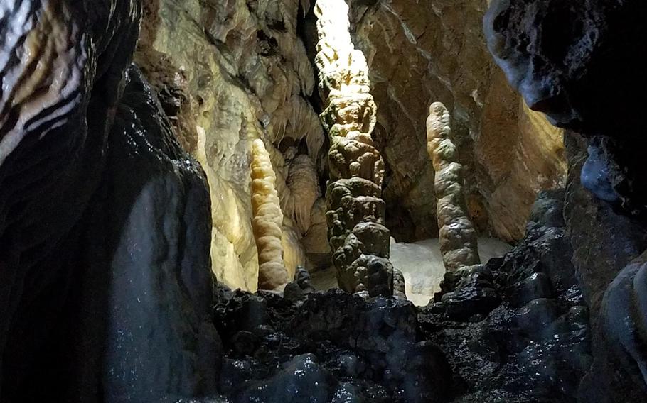 Stalagmites rise from the floor of the Devil's Cave in Pottenstein, Germany.