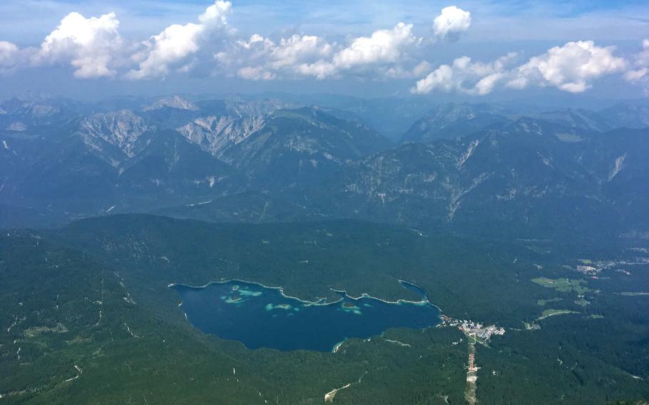 The view from the top of the Zugspitze, Germany's highest mountain. The lake at the base of the mountain is the  Eibsee.