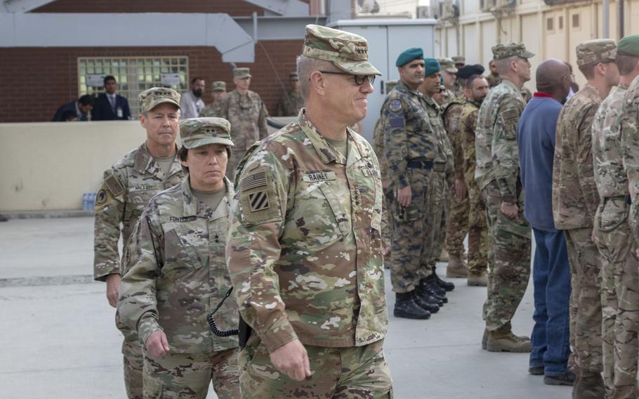 U.S. Army Lt. Gen. James Rainey, front, U.S. Army Maj. Gen. Robin Fontes, center, and U.S. Army Gen. Scott Miller, rear, arrive at a change of command ceremony for Combined Security Transition Command - Afghanistan. Rainey assumed command of CSTC-A during the ceremony in Kabul, Afghanistan.