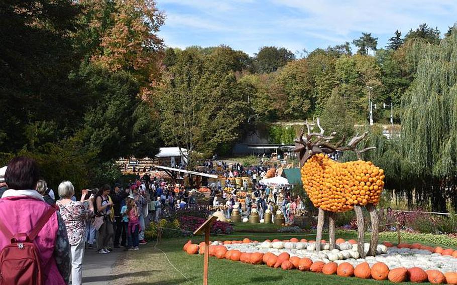 Visitors crowd the walkways and food lines at the pumpkin exhibition in Ludwigsburg, Germany. The busy event runs through Nov. 4 this year.