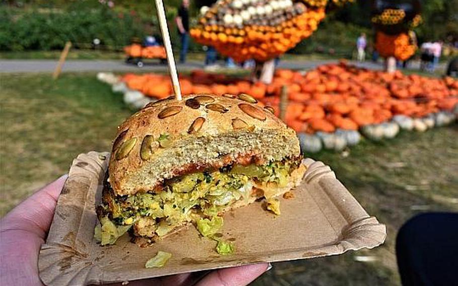 A pumpkin burger is served at the Ludwigsburg pumpkin exhibition in Ludwigsburg, Germany. The event offers pumpkin-flavored bratwurst, ice cream, waffles, soup and many other food options.