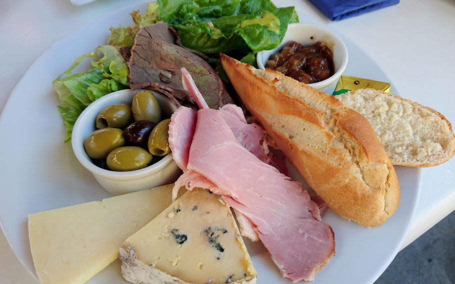 A ploughman's lunch from the Adnams Southwold Store and Cafe in Southwold, England, Saturday, October 20, 2018. This traditional British meal often consists of meat, cheese, bread and beer.