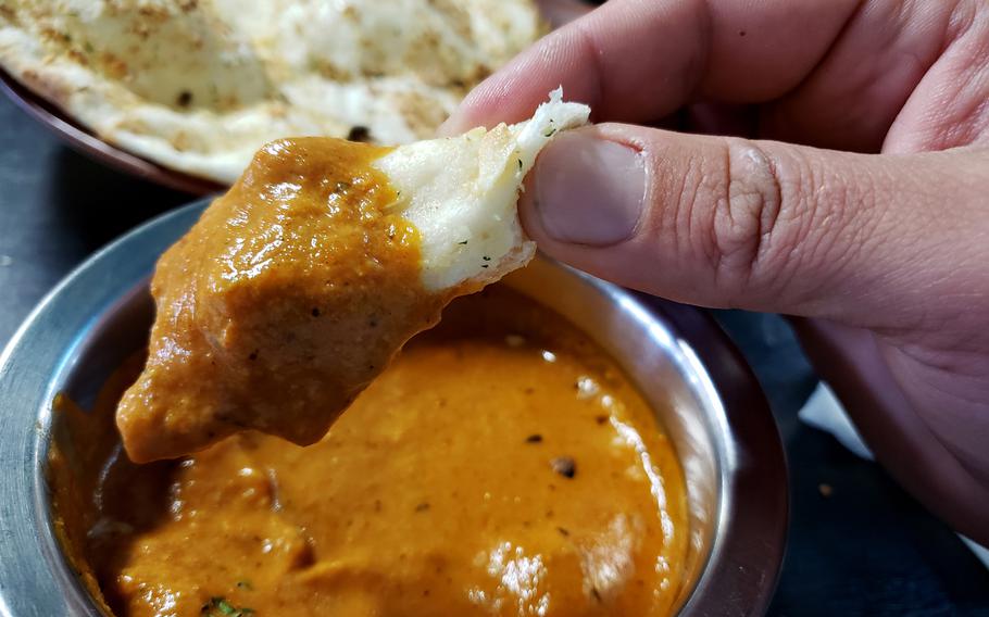 Dana Chula's Creamy Butter Chicken curry is hearty and flavorful, pairing well with the restaurant's freshly baked naan.