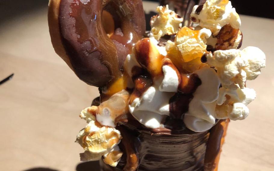 A milkshake named the Ludwigshohe is served at Franz und Sissi restaurant in Kaiserslautern, Germany. The shake, featuring popcorn, pretzels and a donut, is one of many decadent desserts served at the eatery.