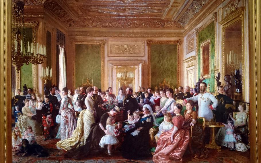 A painting of Queen Victoria's family in 1887 displayed Dec. 15 in the Queen's Gallery at Buckingham Palace, London. The setting for the painting is the Green Drawing Room inside Windsor Castle.