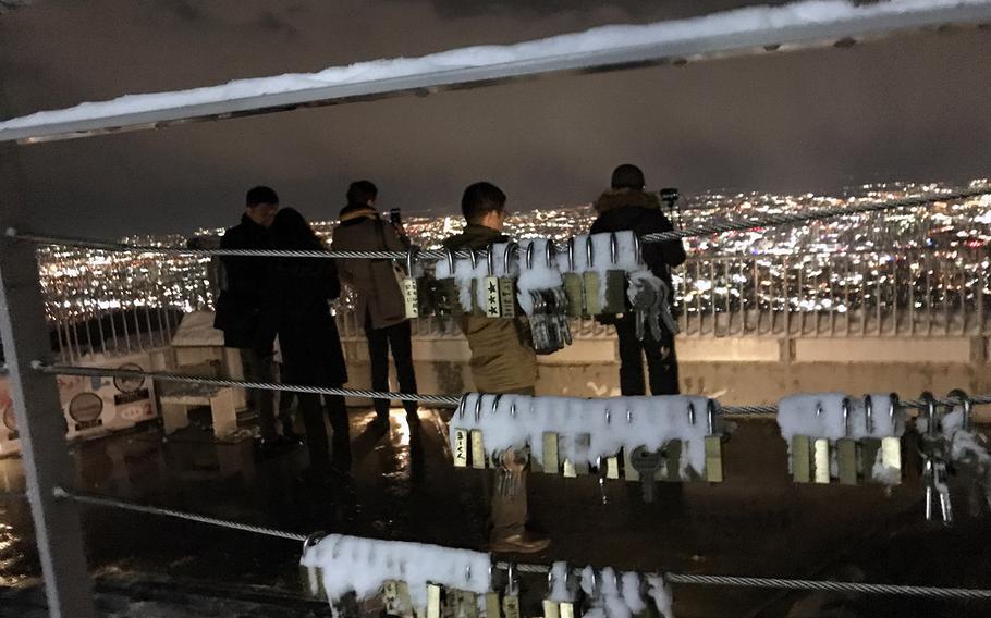 Couples can lock their love by leaving a padlock near the summit of Mount Moiwa with Sapporo's bright lights as a romantic backdrop.