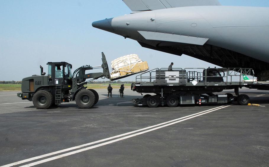 U.S. Air Force personnel unload equipment from a C-17 Globemaster III for use during the transport of Rwandan soldiers in Bangui, Central African Republic in 2014 in support of an African Union effort to quell violence. Now, Russia is getting more involved in the country, where there is discussion about a possible Russian base. 
