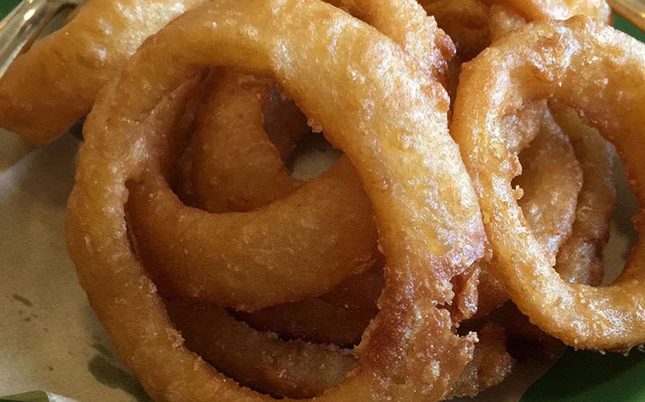 The onion rings at Ralph's Burger Restaurant are fried to a perfect golden brown.