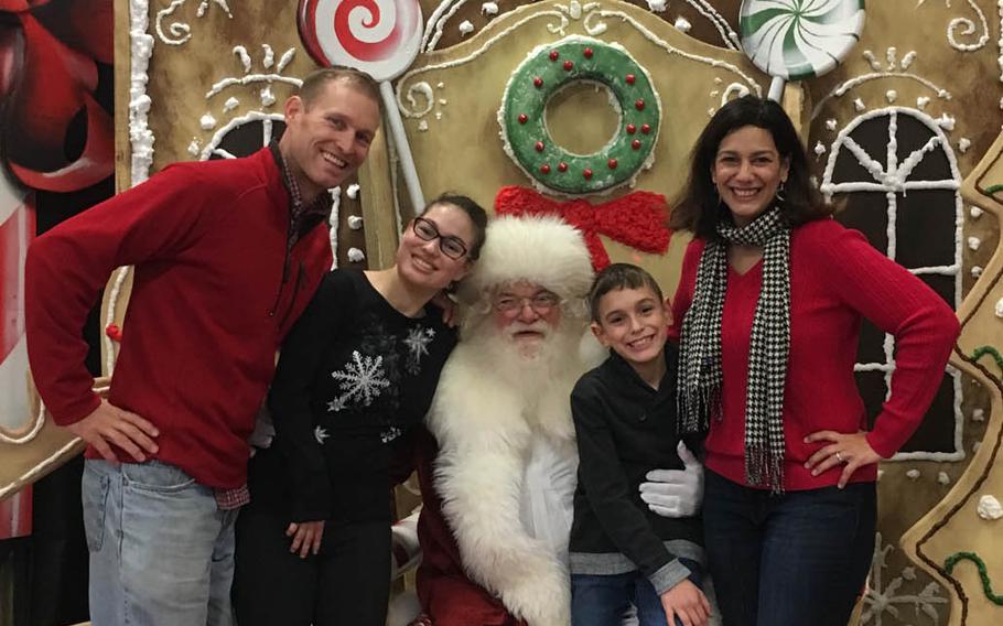 Navy Capt. Cassidy Norman, left, with his daughter Marisa, 15, son Chase, 9 and wife Michelle, pose with Santa near home in Virginia Beach in December 2018. The  Normans are fighting the school district to keep Marisa, who is severely disabled, in a private school.