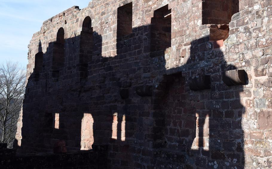 Mid-day shadows loom large on a wall at Hohenecken castle south of Kaiserslautern, Germany.