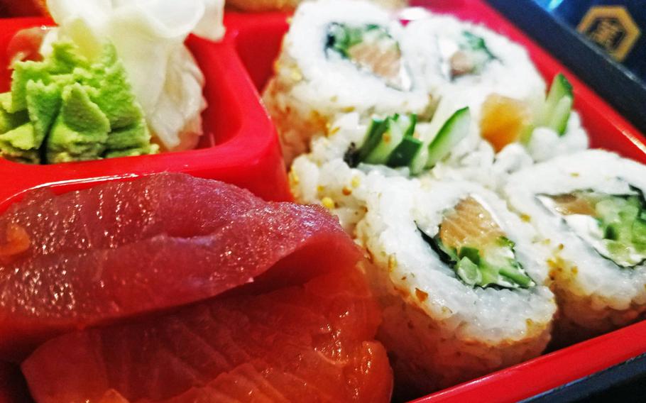 Sashimi and sushi rolls in a bento box from Sushihaus Japaniche Kuche in Weiden, Germany.