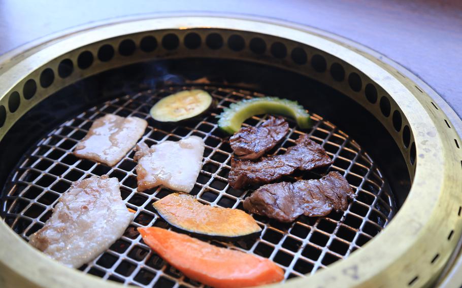 Ryukyu BBQ Blue specializes in yakiniku -- a type of Japanese cuisine where diners cook a variety of cuts of meat at their table upon a small grill.